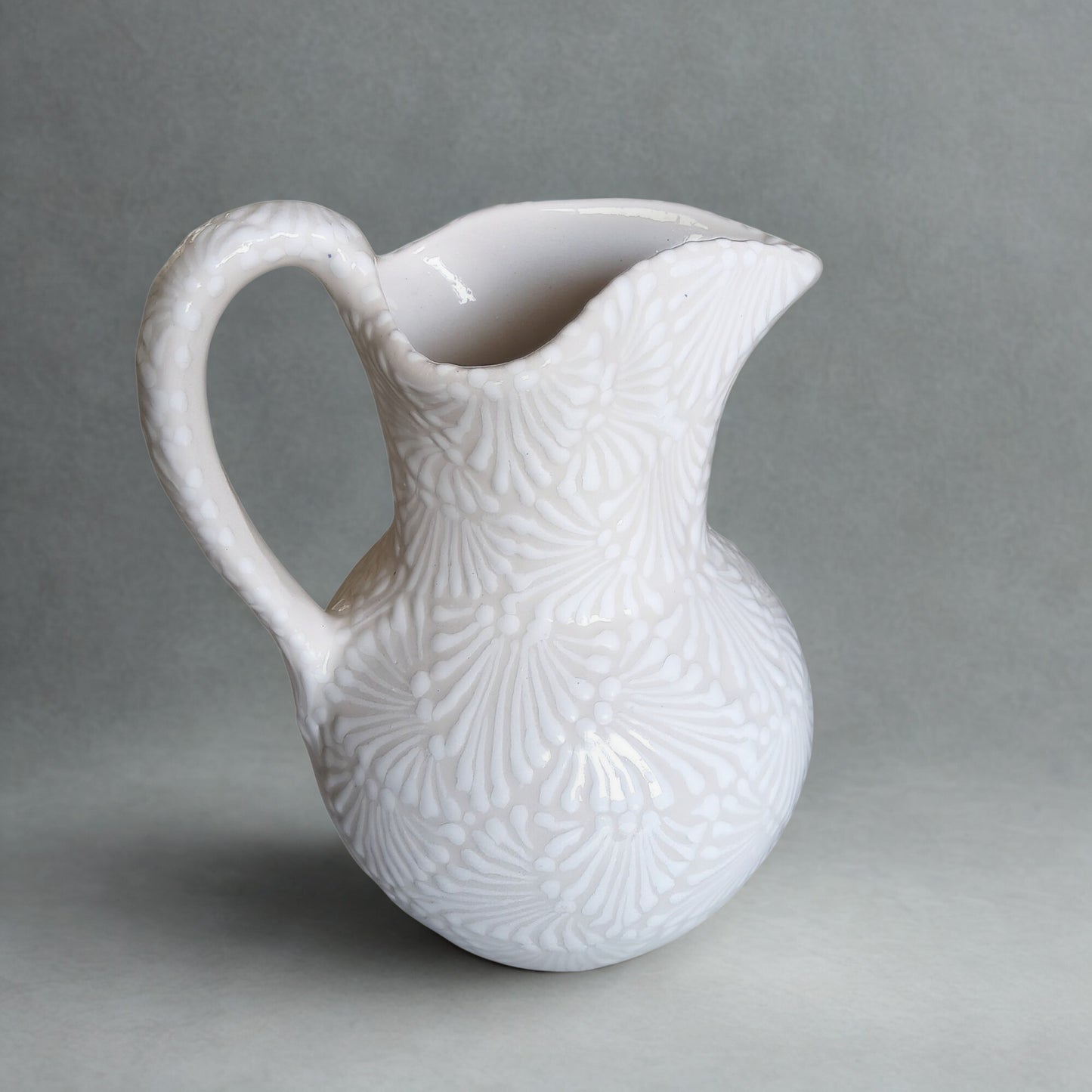Handcrafted Ceramic Pitcher – Large White Embossed Design
