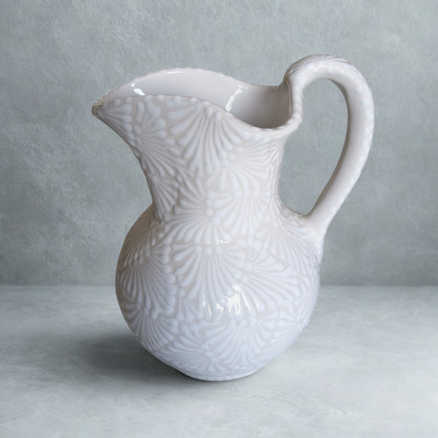 Handcrafted Ceramic Pitcher – Large White Embossed Design