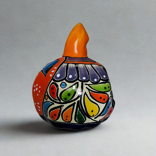 Decorative ceramic vase with colorful floral patterns on a gray background